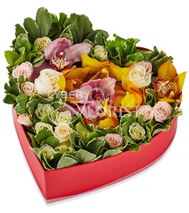 roses and orchids in a heart shaped box